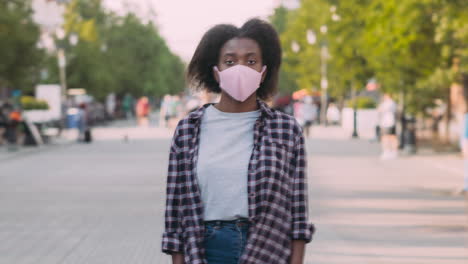 woman wearing mask on city street