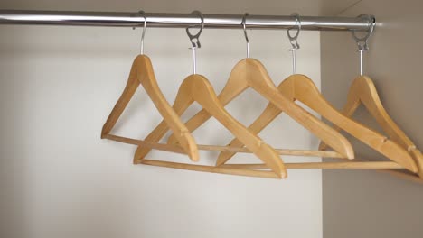 wooden hanger for clothes closeup