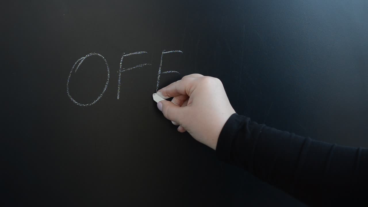 Discount text on a board. We write with chalk on a board