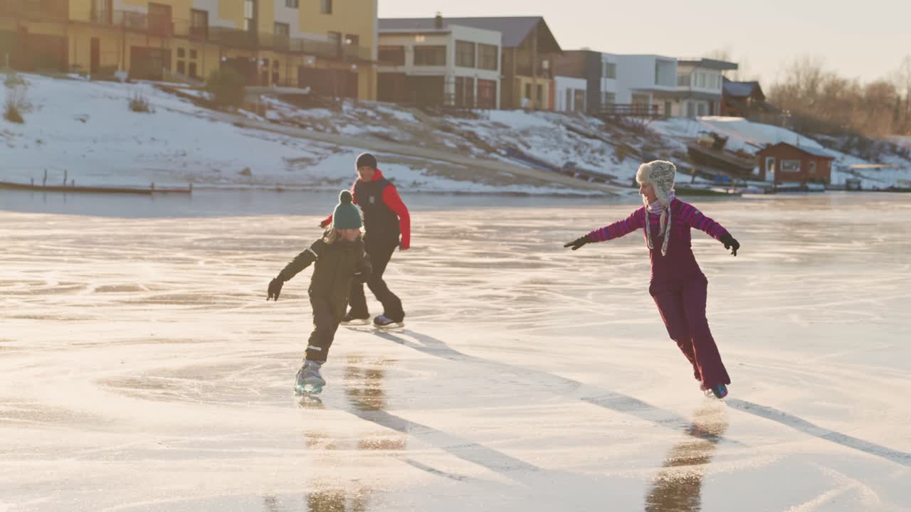 Family Ice Skating on a Frozen Lake