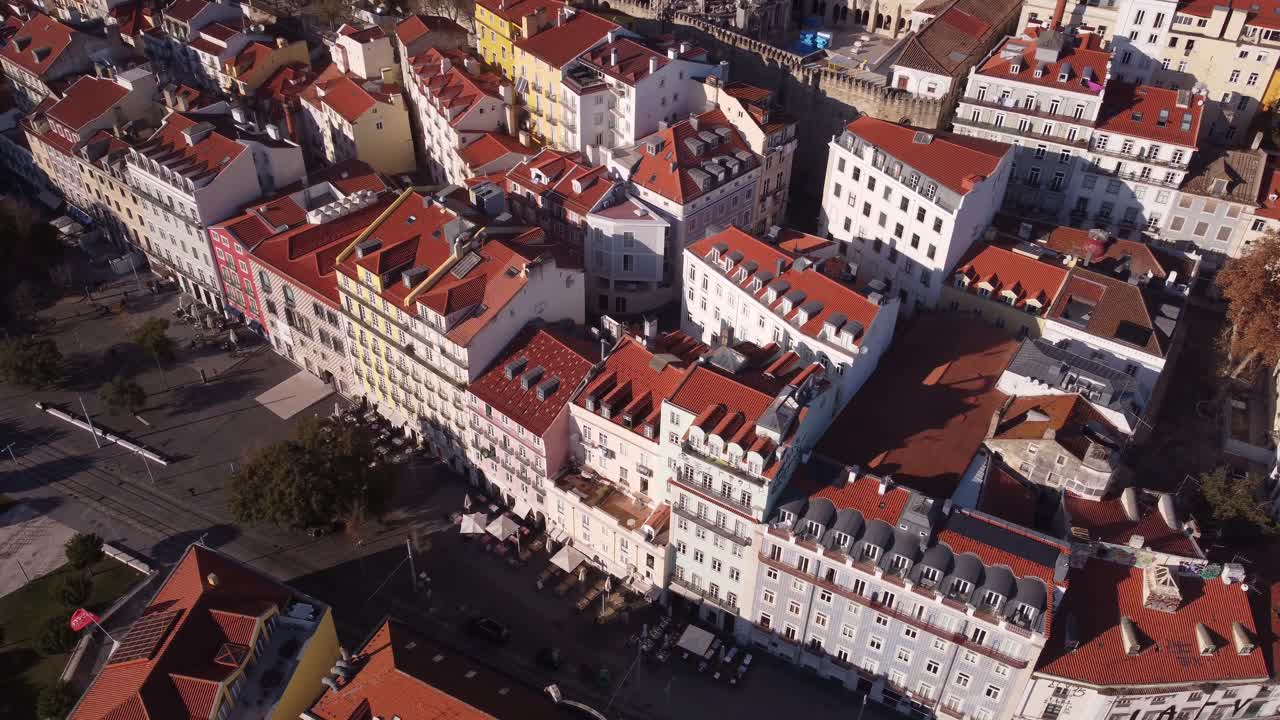 Drone descending over Alfama with the famous Casa dos Bicos José Saramago Foundation on a bright and sunny day in Lisbon Portugal Europe in Winter