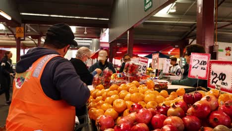 vendor selling fruits at melbourne market