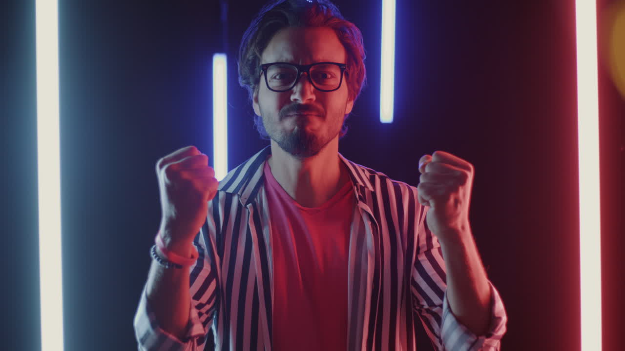 Angry Man Under Neon Lights