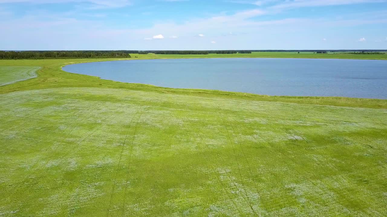 high aerial view tremendous landscape with lake and fields