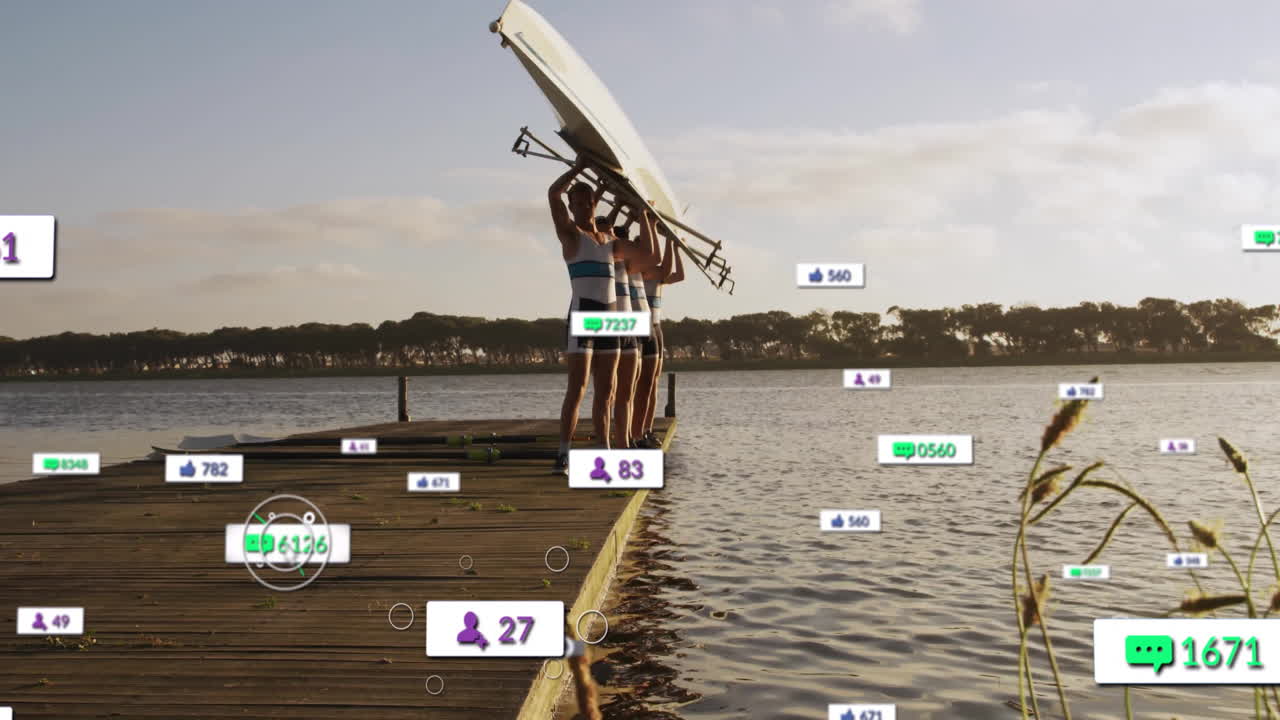 Team of rowers carrying racing shell on lakeside dock, showing technology driven social media icons
