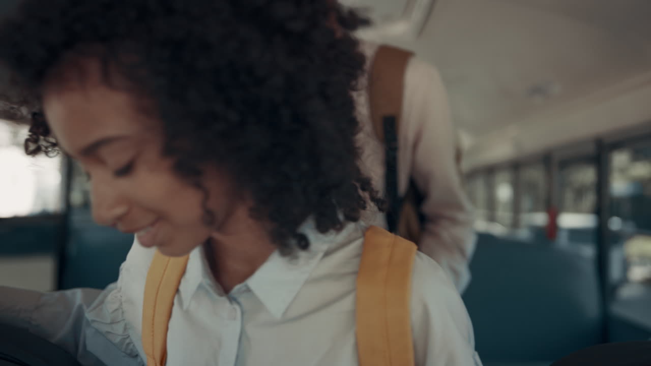 Group children leaving schoolbus hurrying classes sunny morning close up.