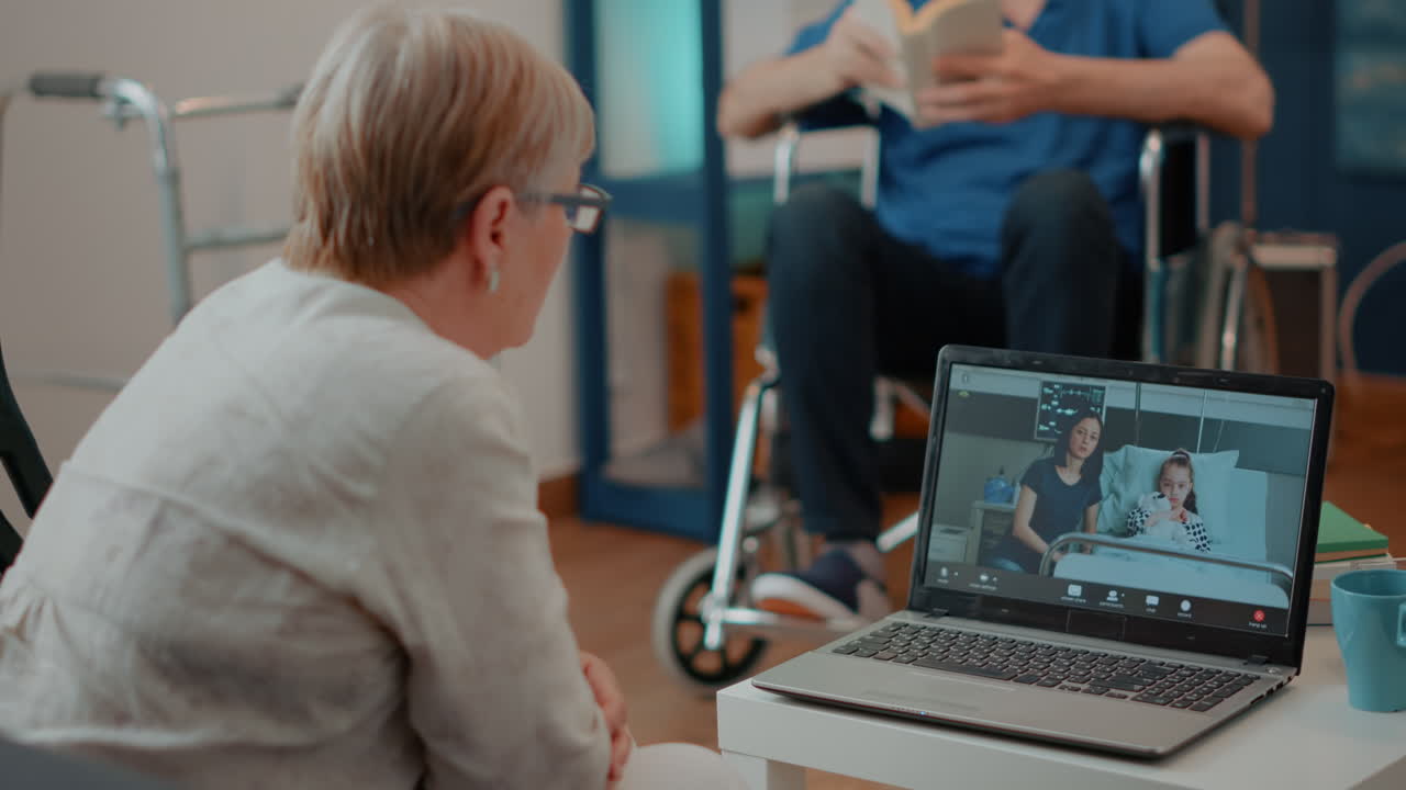 Elderly couple using video call to connect with family