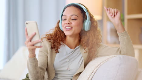 Carefree-female-dancing-and-having-fun-alone