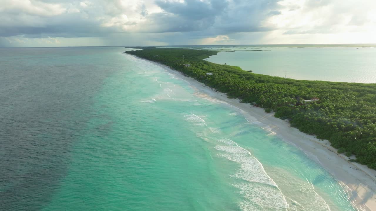 Aerial drone fly white sand pristine beach in Tulum, Mexico, Yucatan peninsula landscape