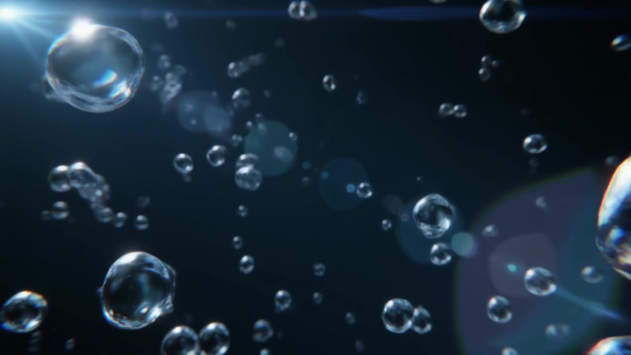 Floating Water Droplets Rising Against a Dark Background