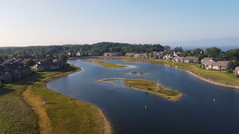 tilting from bird's eye view over the marina in muskegon's beachwood neighborhood