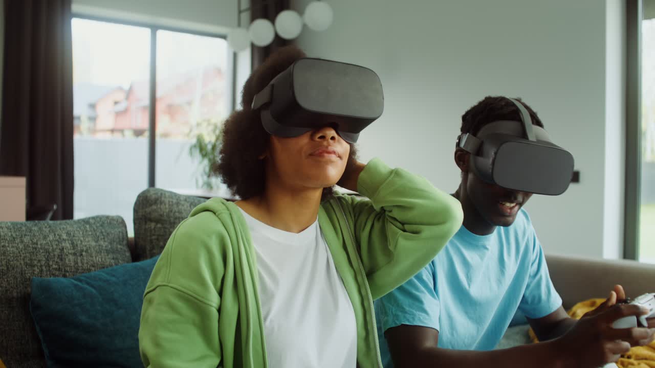 Couple Having Fun Playing VR Games at Home