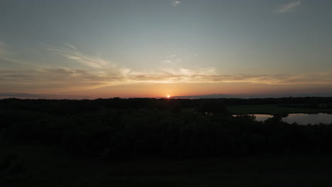 dusk over nature silhouettes in busch memorial conservation area, missouri usa