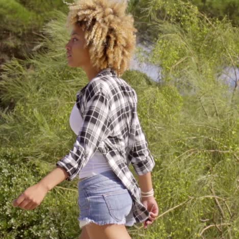 young black hitchhiking woman