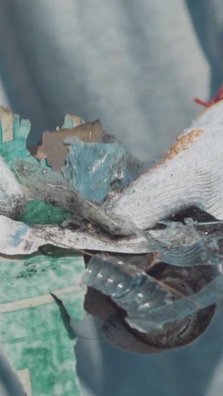 Plastic waste in hands volunteer calling to fight environmental pollution