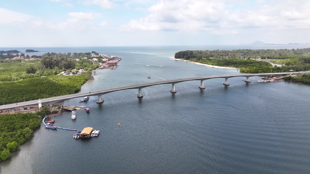 Siri Lanta Bridge in Koh Lanta Island, Krabi, Thailand. Remote place with ferry terminal and village.