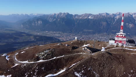 Patscherkofel-Mountain-And-Ski-Area-With-Restaurant,-ORF-Radio-and-TV-Tower-At-Daytime-In-Tyrol,-Austria