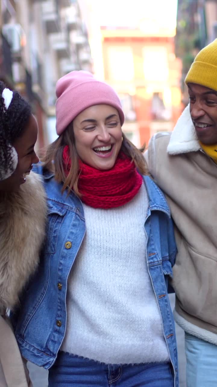 Group of friends walking and socializing in the city
