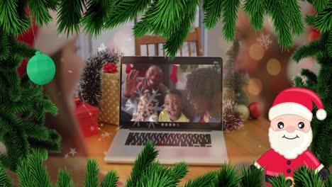 Animation-Von-Weihnachtsdekorationen-über-Einer-Afroamerikanischen-Familie,-Die-Einen-Laptop-Videoanruf-Führt