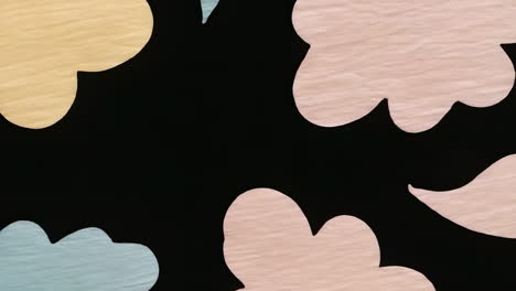 abstract softly colored shapes on black background