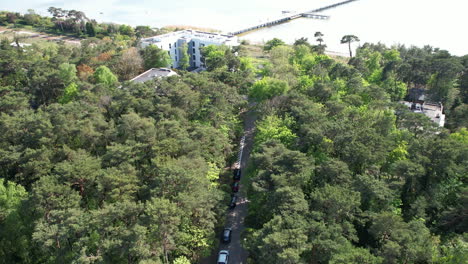 direct access to the pier in jurata between green trees