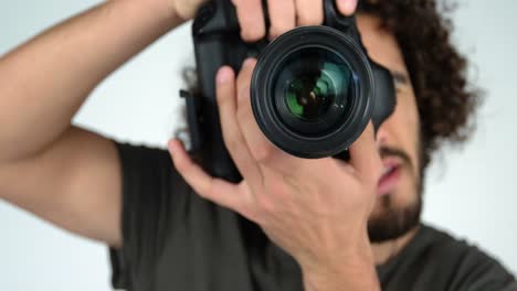 photographer taking photo with professional digital camera