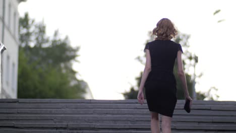 woman walking upstairs