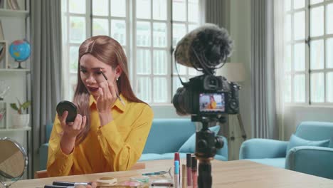 Influencer Young Transgender Woman Blogger Talks About Makeup. Transgender Woman Recording Video Blog Tells How To Be Beautiful. Blogger Talks Facial Beauty Treatments. Vlogger Broadcasts How To Use Of Cosmetic In Home Studio