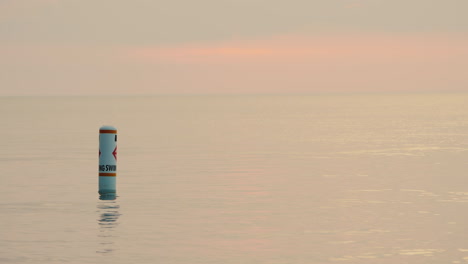 life buoy indicates the boundary beyond which swimmers cannot swim