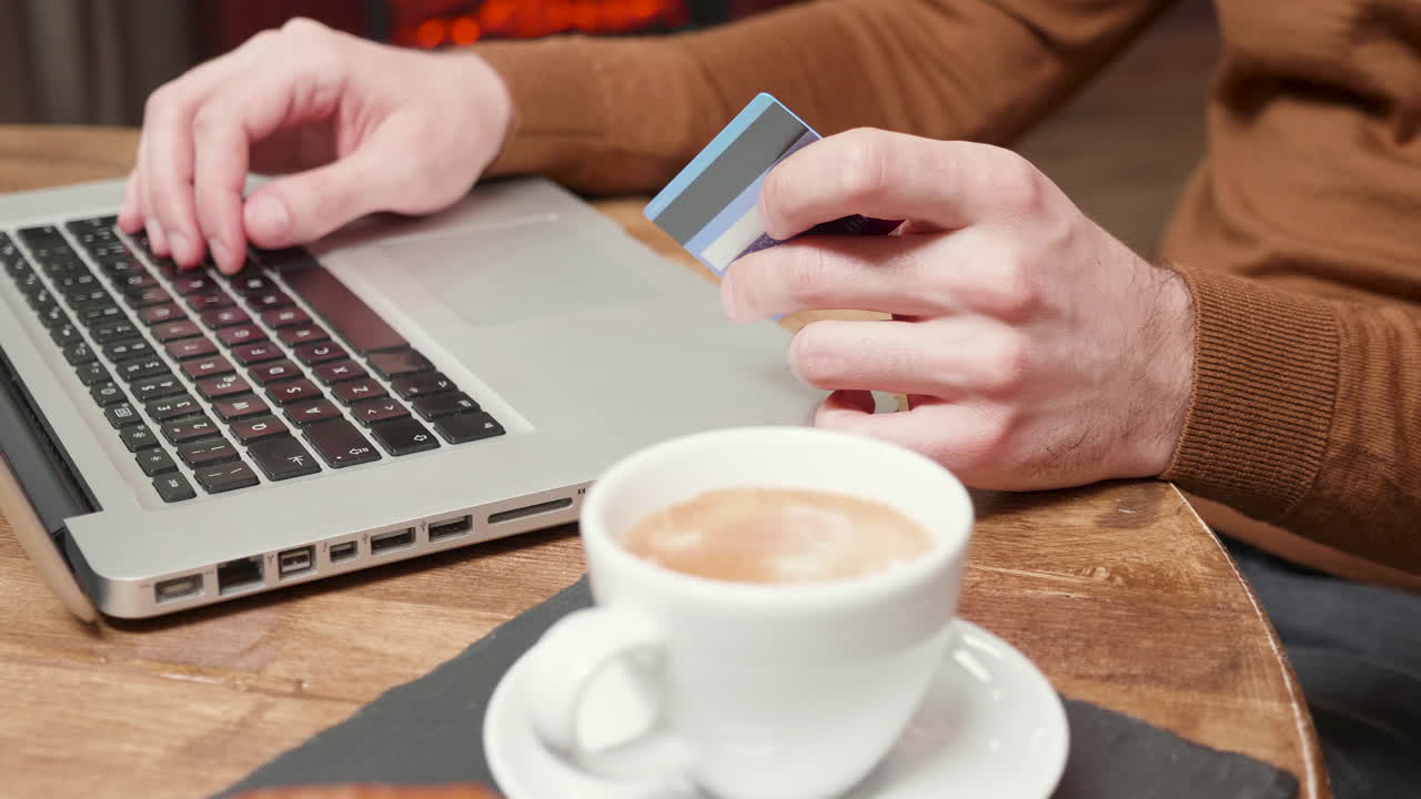 Online shopping with credit card and laptop