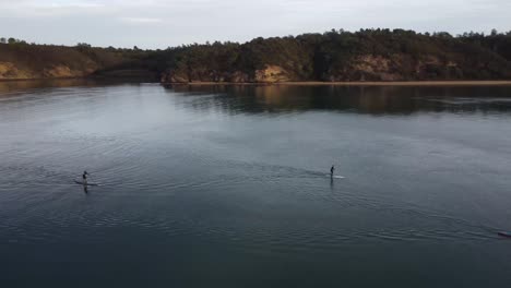 Standup-Paddleboarding-group-paddling-in-Milfontes,-Lisbon-Portugal