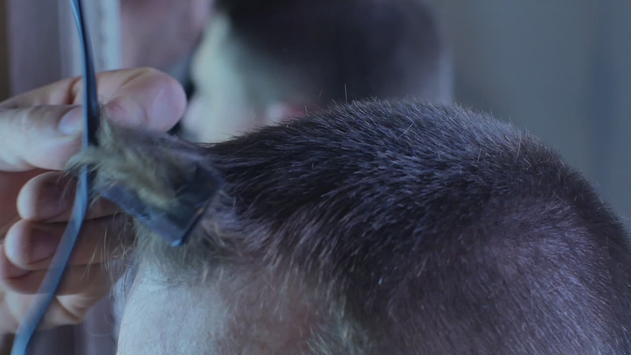 Close-Up Coronavirus At-Home Haircut. 4K Footage