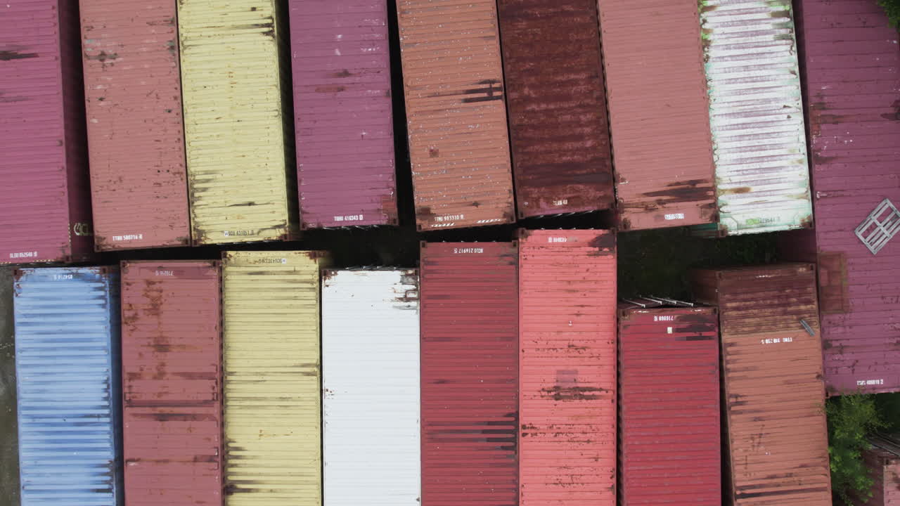 Colorful aerial view of stacked shipping containers in Sweden
