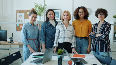 successful women team in office meeting