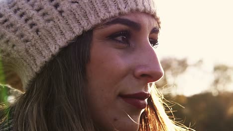 lens flare over a successful woman thinking and looking for inspiration outside