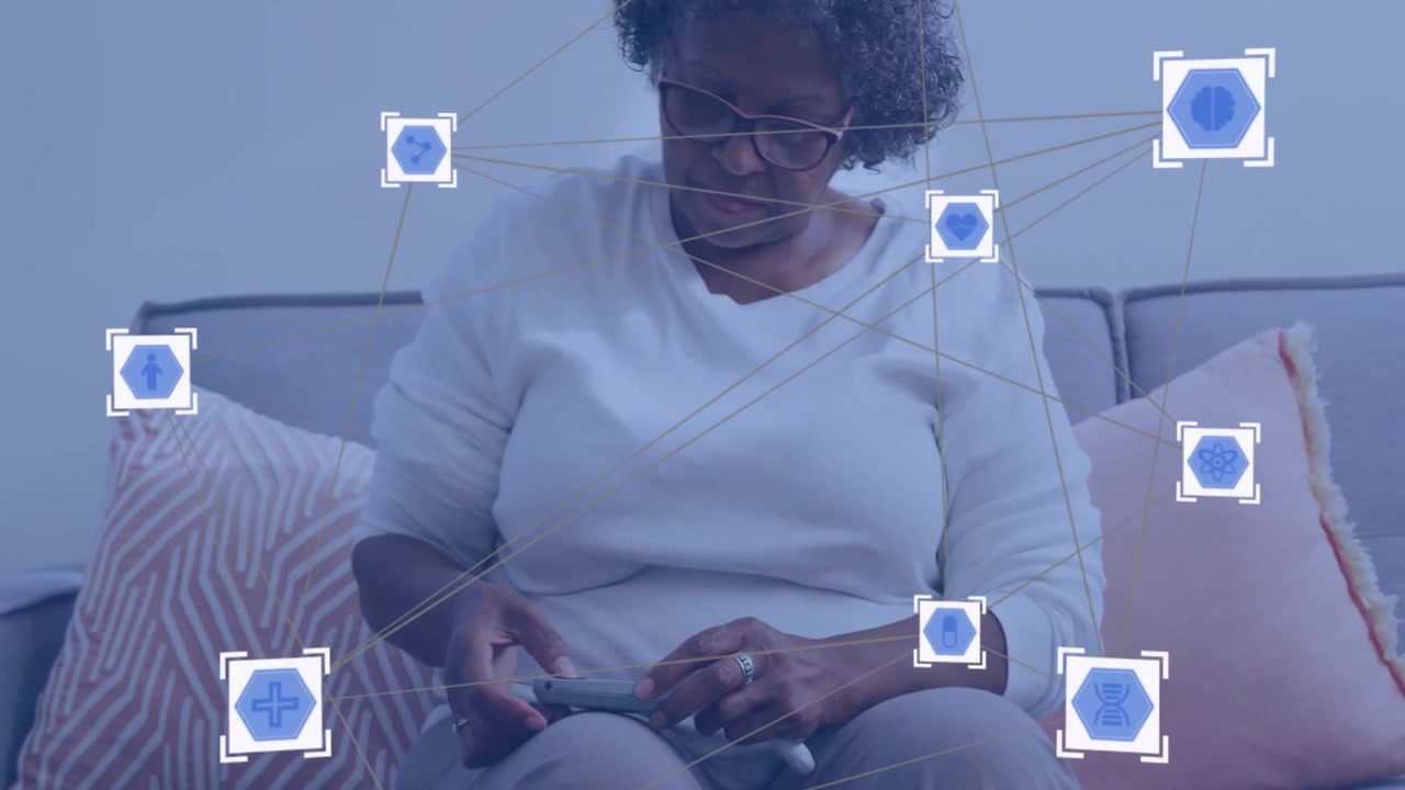Animation of network of connections with icons over senior african american woman using smartphone