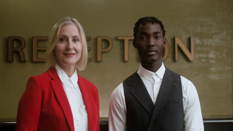 multicultural receptionists at the hotel reception desk