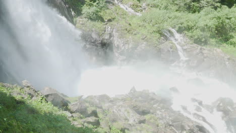 splashing water from a waterfall in the wood slow motion 100 fps