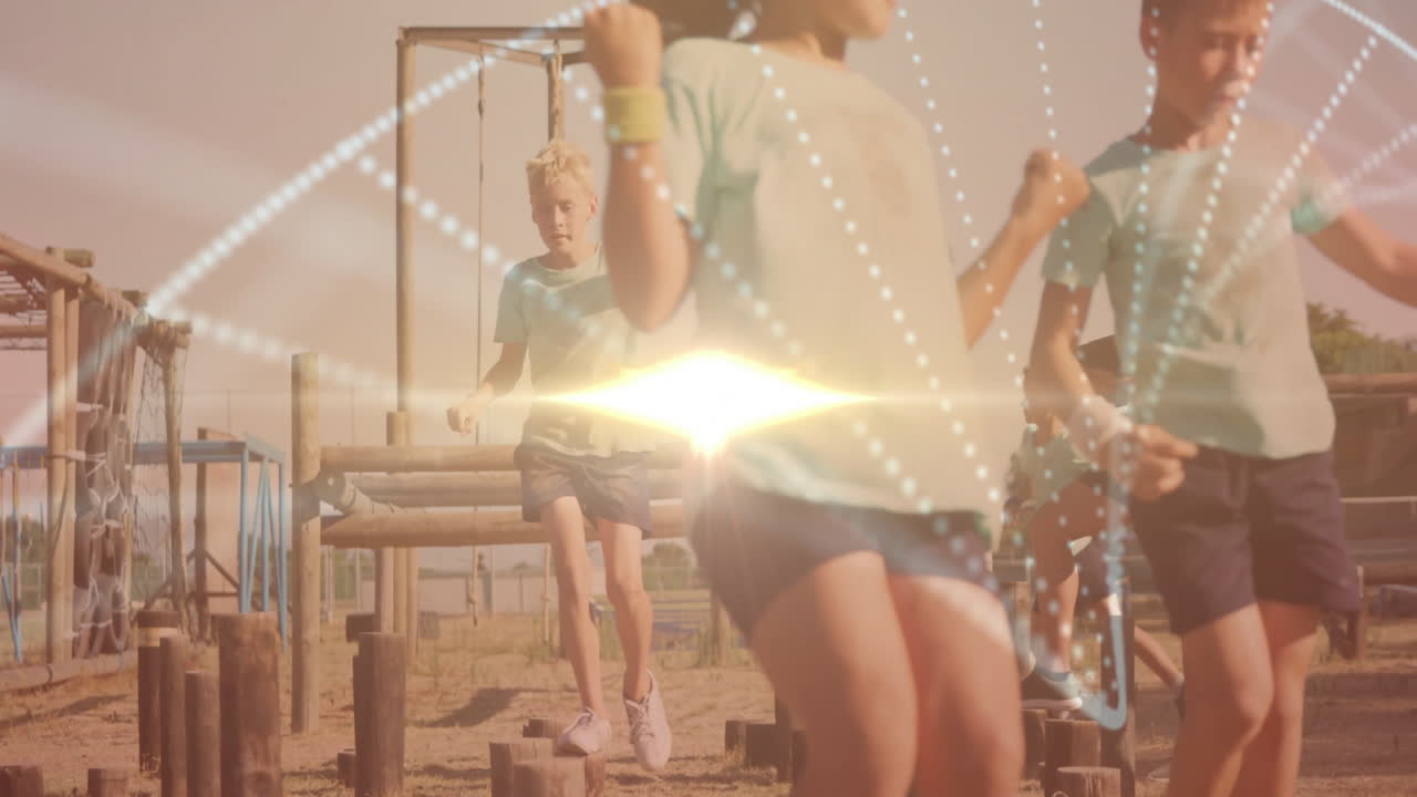 Navigating obstacle course, children with digital network animation overlay in school