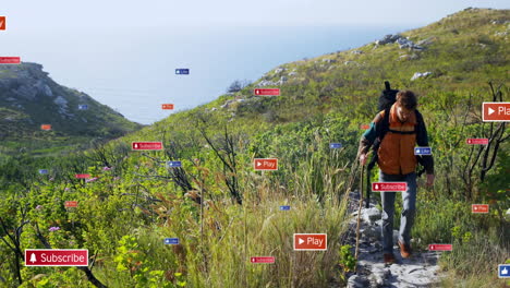 male hiker walking on coastal hillside trail, showing floating social media icons for marketing