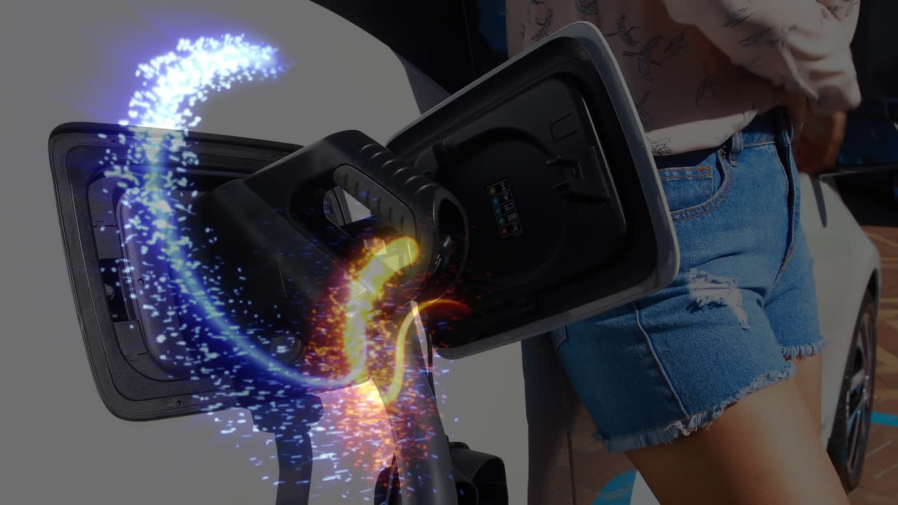 네트워크의 반 ⁇ 이는 선으로 전기 자동차를 충전하는 여성