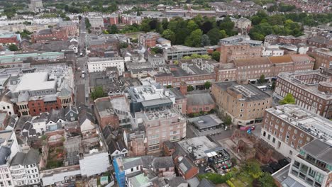 Aerial-orbit-capturing-the-vibrant-heart-of-Exeter-city-center-in-Devon,-UK