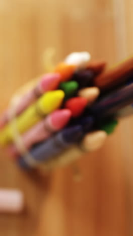 close-up of colorful crayons and colored pencil