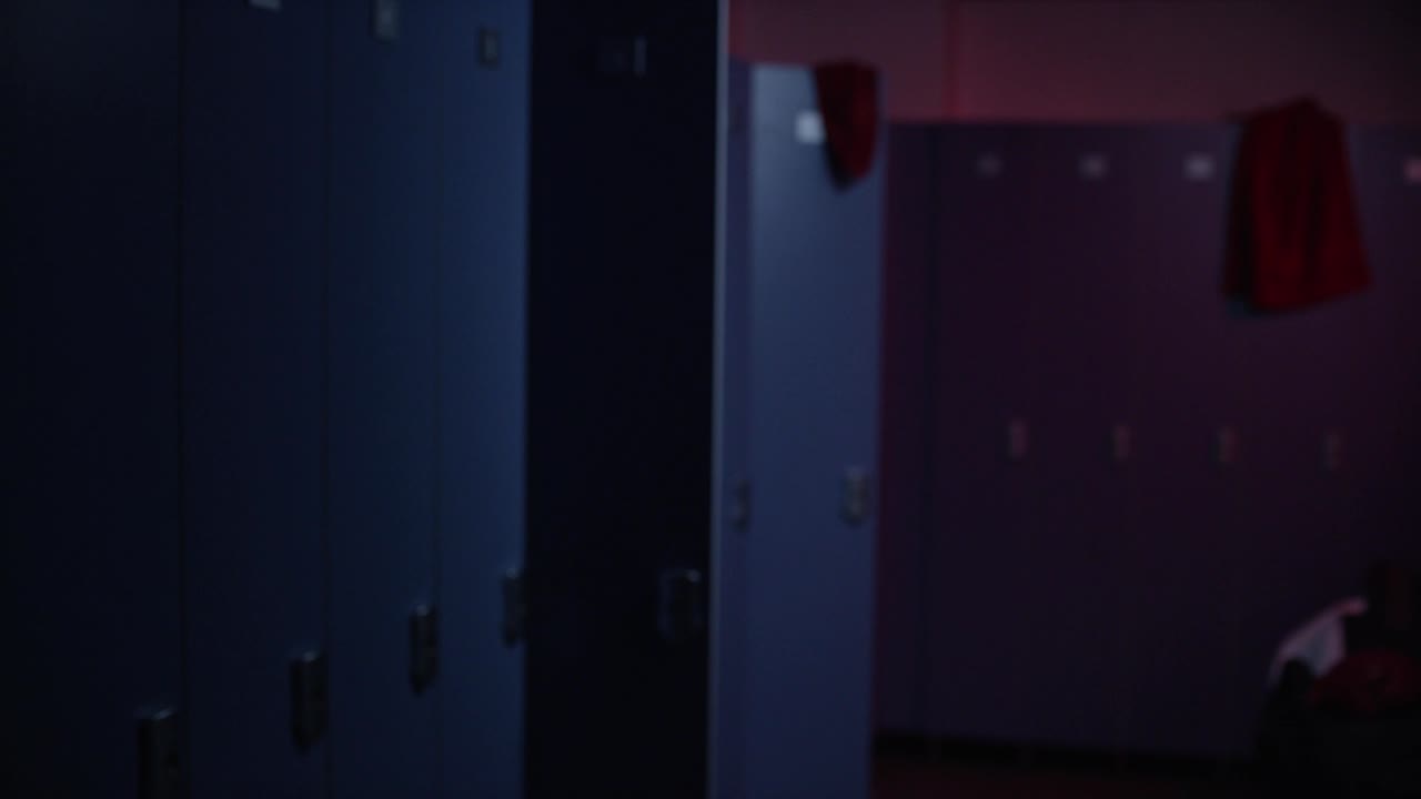 옷차림실에 있는 운동선수