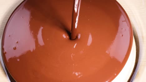 smooth chocolate being poured onto a surface