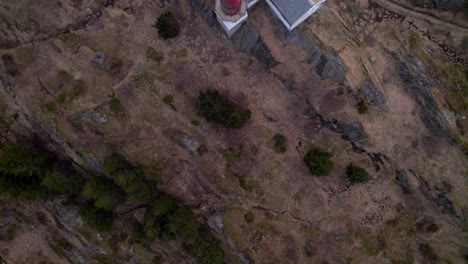 Birds-Eye-view-from-a-historical-lighthouse-in-Northern-Norway-located-in-Moskenes,-Nordland,-Lofoten-Island