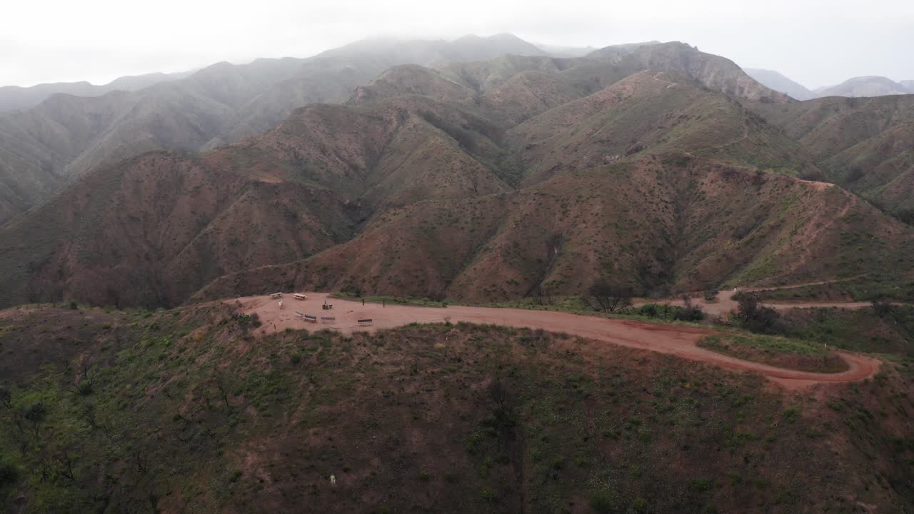 Wide panning aerial shot of Inspiration Point after the wildfire at Will Rogers State Historic Park in Pacific Palisades, California. 4K
