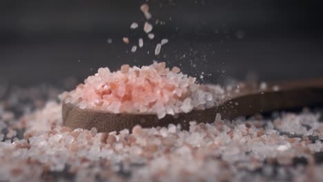 Himalayan-pink-salt-in-a-wooden-is-used-to-flavor-food.-Due-mainly-to-marketing-costs,-pink-Himalayan-salt-is-up-to-twenty-times-more-expensive-than-table-or-sea-salt.