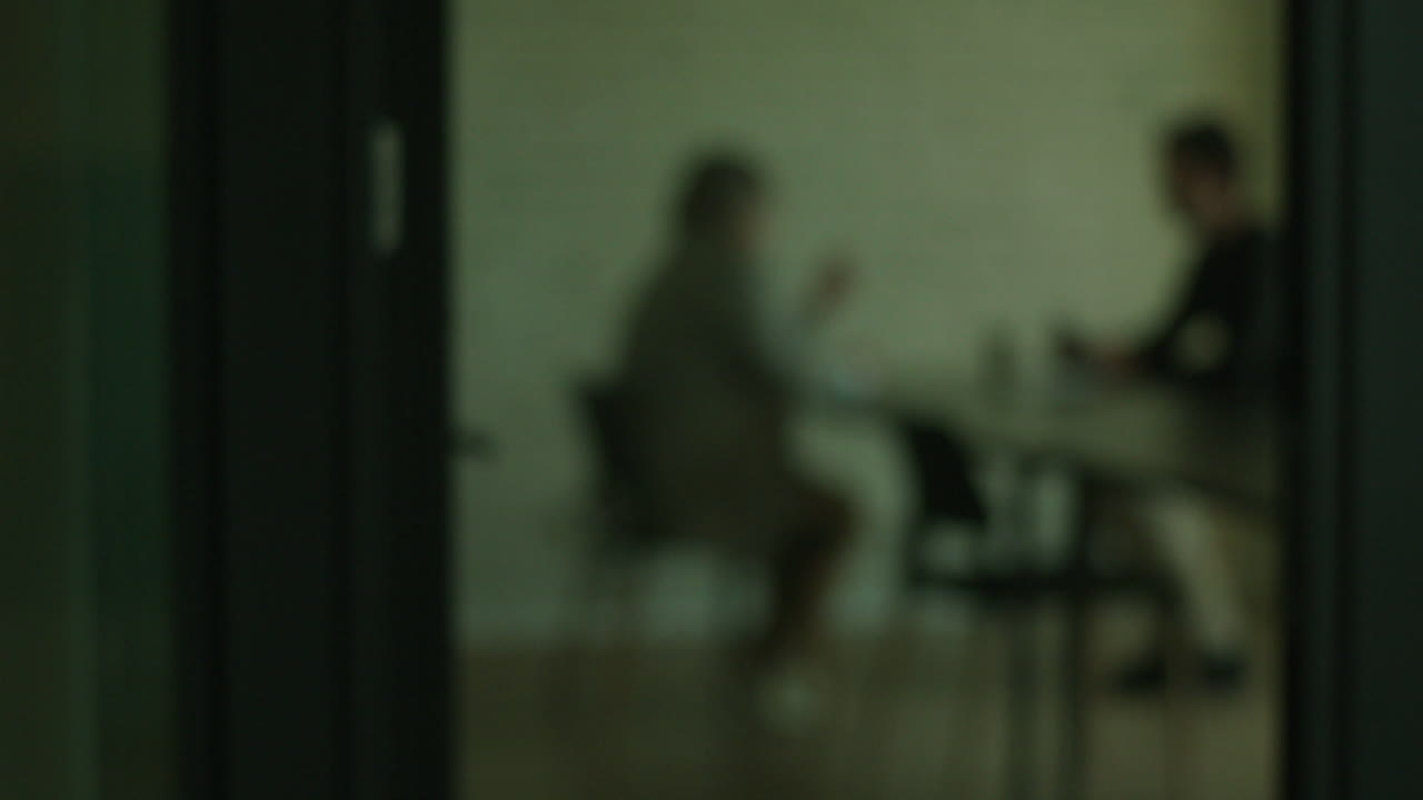 Blurry Office Meeting