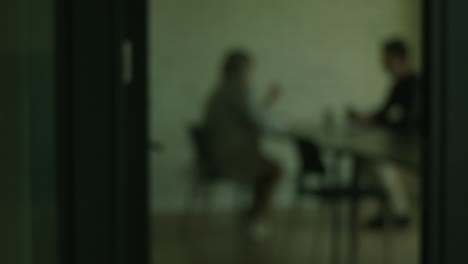 blurry office meeting